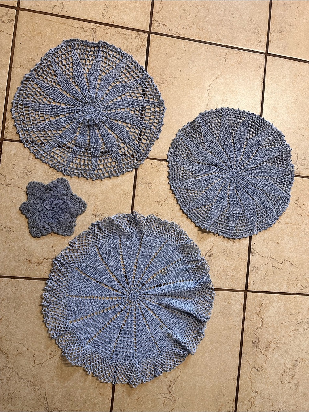 Blue Crochet Doily Set - Home Accents, 
(2) 13”, (1) 16”, (1) 6” star shaped.